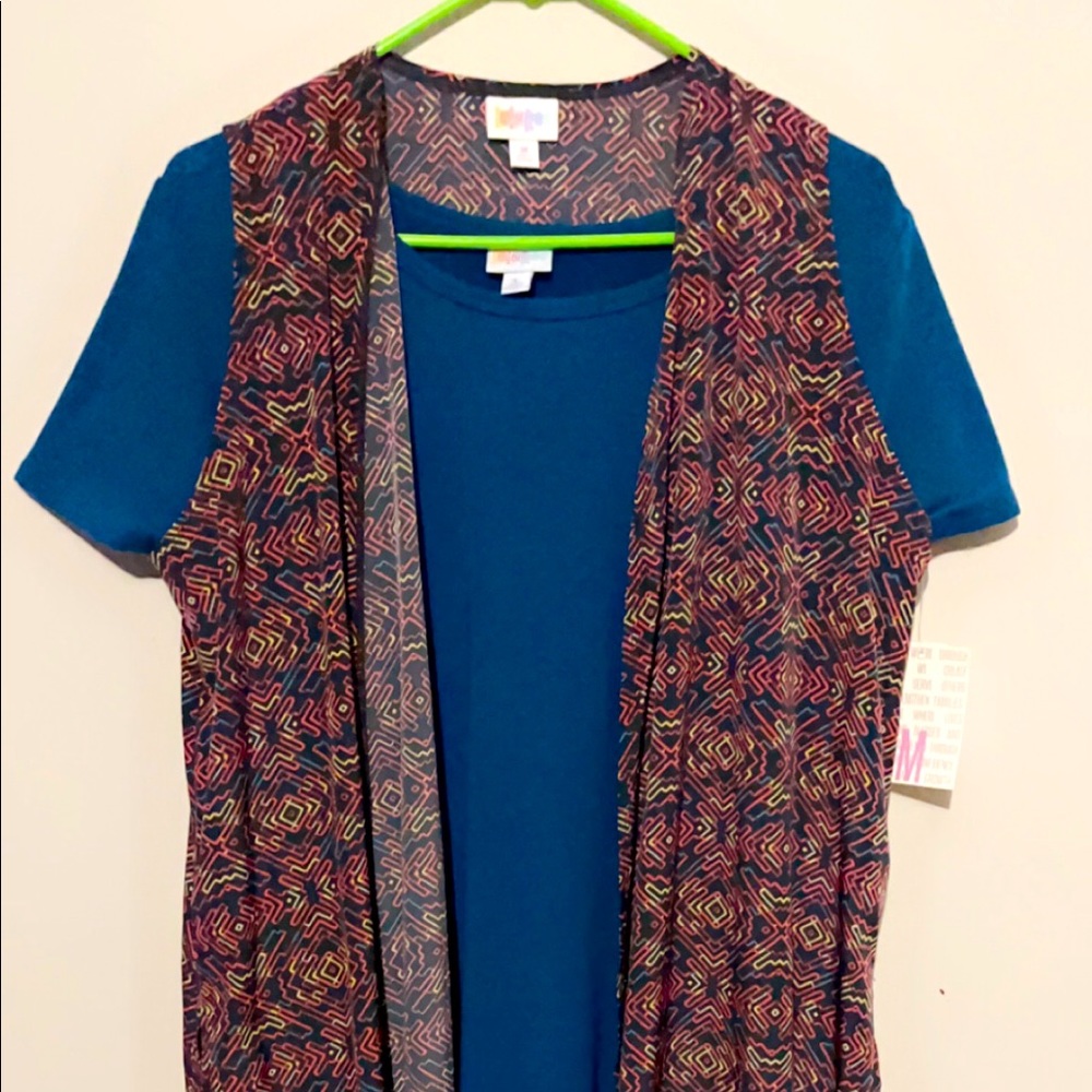 Size Medium Joy. Size large dress. Will separate.